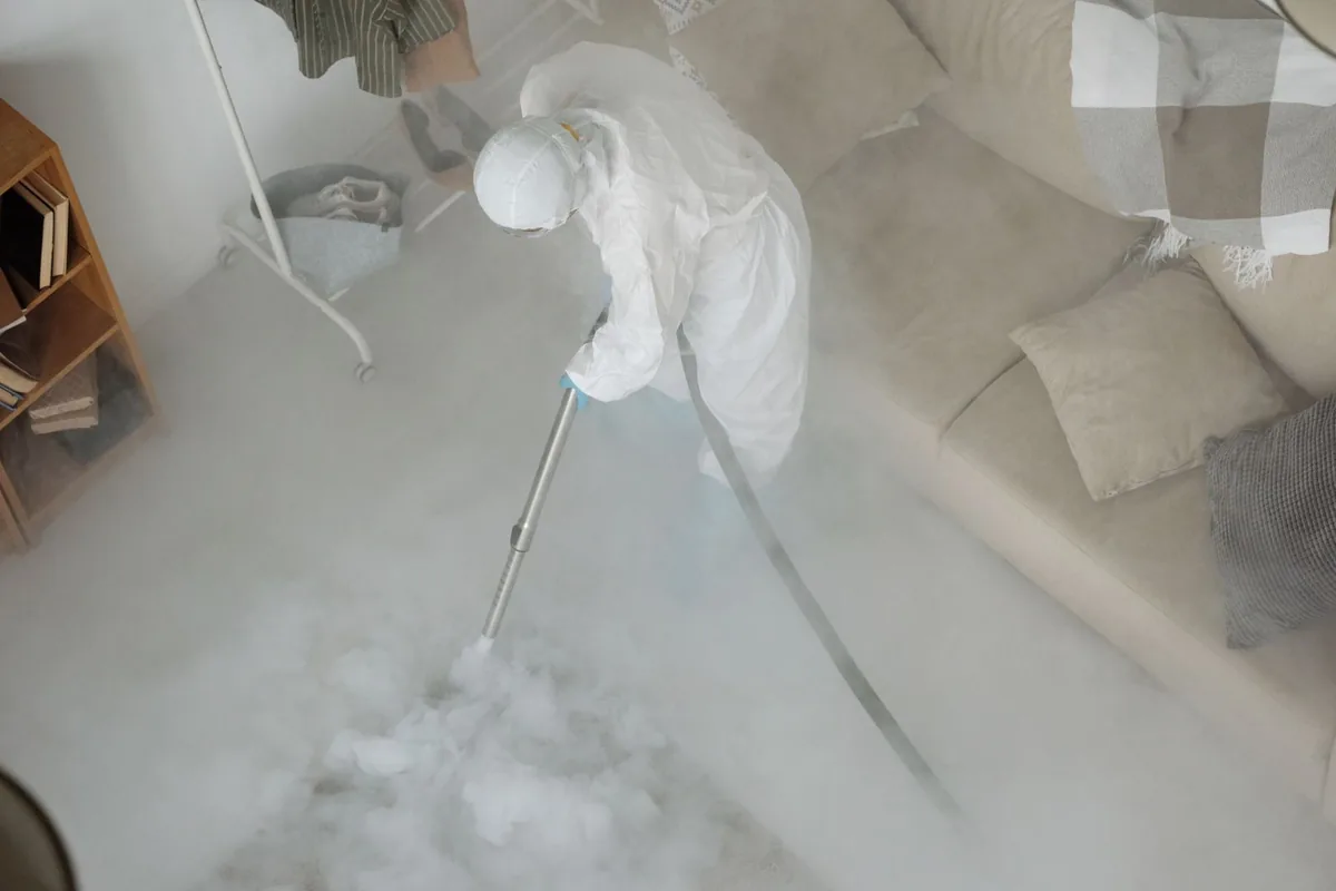 Biohazard cleanup technician in protective equipment, Brookridge, FL